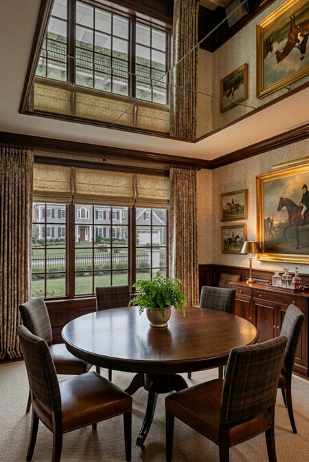 Traditional dining room with a mirrored ceiling