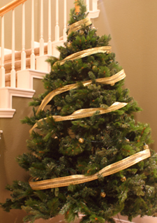The barber pole method for applying ribbon garland to a Christmas tree