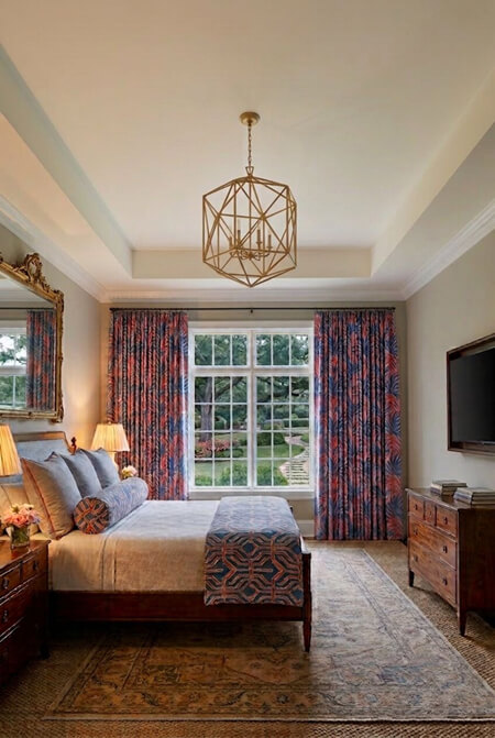 Bedroom with a tray ceiling
